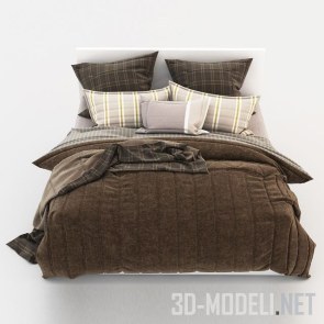 Двуспальная кровать со стеганым одеялом