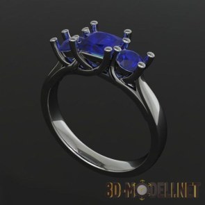 Темное кольцо с синими камнями