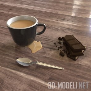 Чашка с кофе и кусочек шоколада