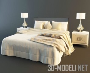 Кровать с белым покрывалом