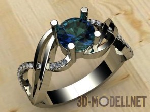 Женское кольцо из белого металла с синим камнем