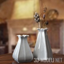 Пара керамических ваз с сухими веточками