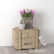 Корзина с тюльпанами на деревянном ящике