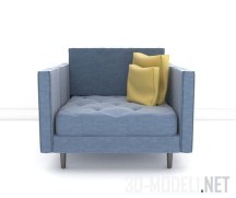 Голубое кресло с желтыми подушками