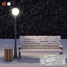 Укрытая снегом скамейка, фонарь и урна