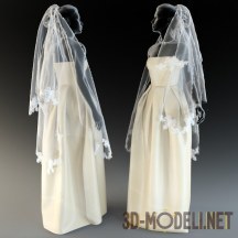 Свадебное платье с фатой на манекене