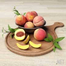 Персики в миске и на разделочной на доске