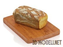 Буханка хлеба на доске