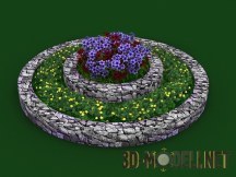 Каменная клумба с цветами
