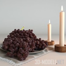 Черный виноград и свечи