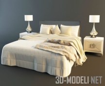 Кровать с белым покрывалом