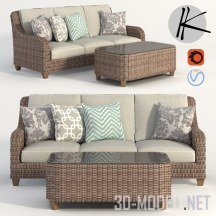 Плетеный диван с подушками и столик