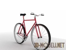 Двухколесный велосипед с красной рамой